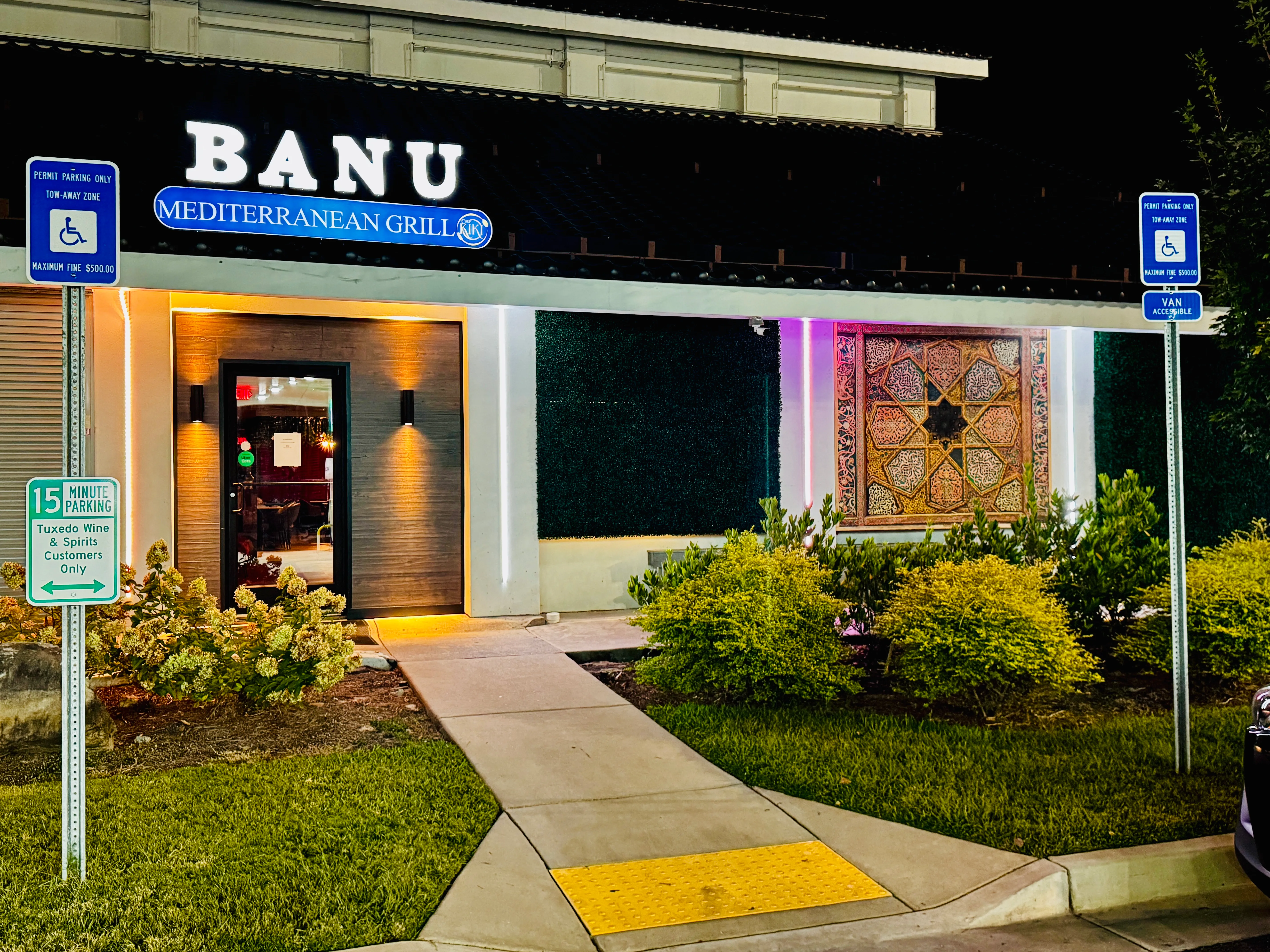 Banu Mediterranean Grill exterior at night